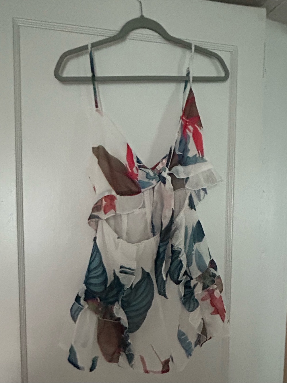 Luxxel White Floral Print Ruffle Romper with Blue and Brown Accents